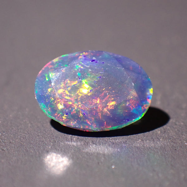 Black Opal 10.5x7.5mm Faceted Oval Gemstone