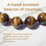 Hand-knotted 6mm natural golden-brown Tiger's Eye gemstone bracelet with an adjustable minimalist closure.